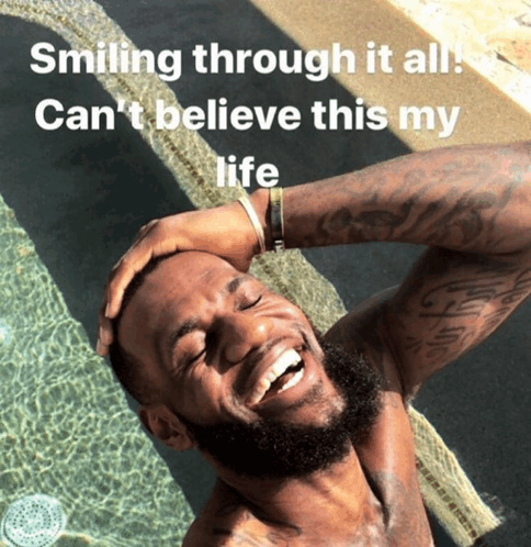 Laughing poolside — “smiling through it all, can't believe this my life”